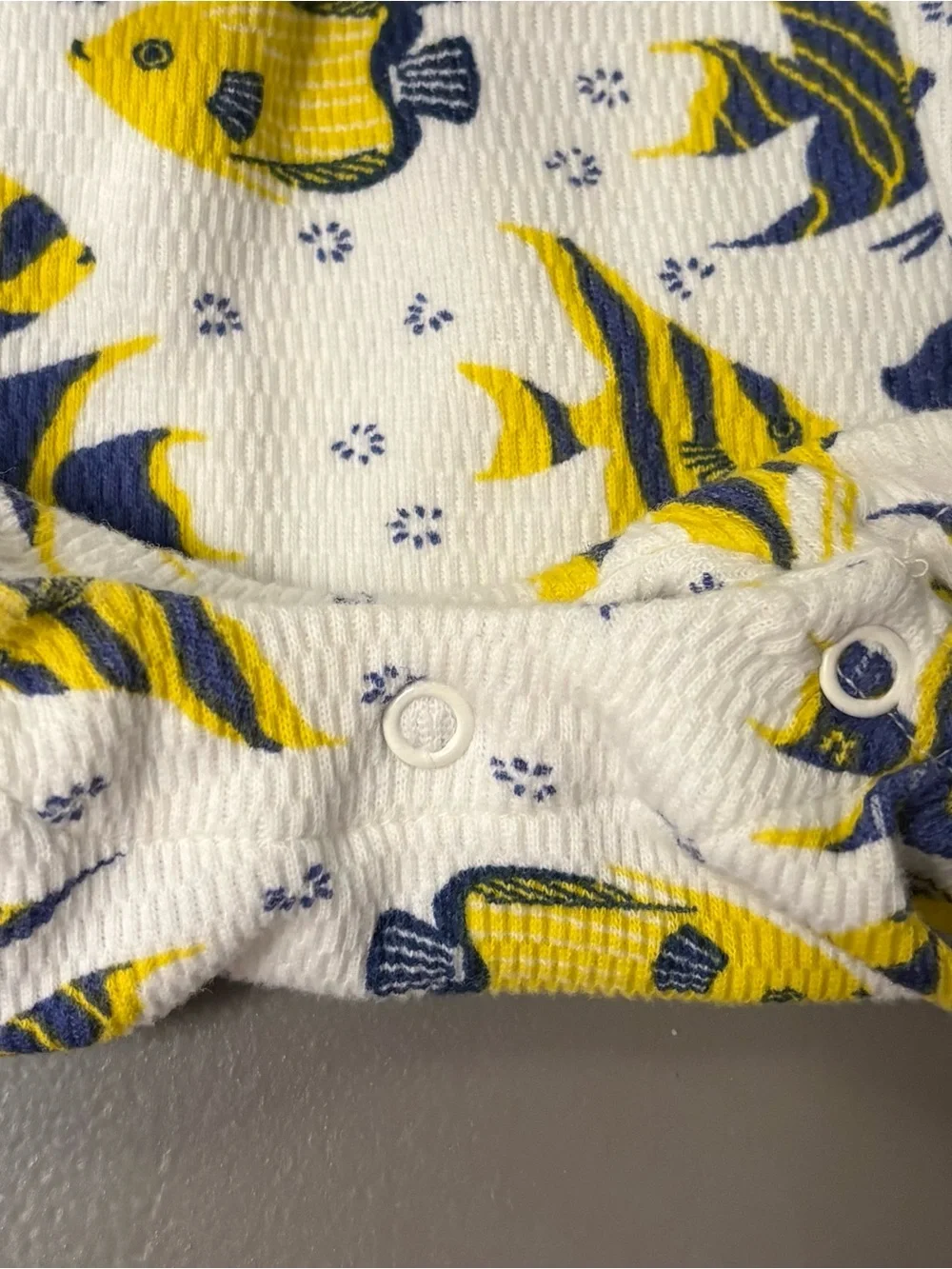 Baby Ruffle One-Piece in White with Yellow & Navy Fish Print
